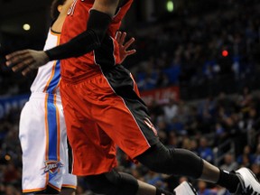 Raptors shooting guard Terrence Ross gets blocked on a dunk attempt by Thunder shooting guard Jeremy Lamb during the second quarter in Oklahoma City last night. (USA TODAY/photo)