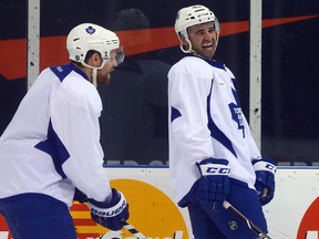 Phil Kessel and Nazem Kadri joke around during Leafs practice at the Mastercard Centre on December 22, 2013. (Dave Abel/Toronto Sun/QMI Agency)