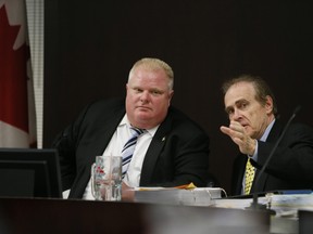Mayor Rob Ford (left) and Deputy Mayor Norm Kelly pictured at an executive committee meeting at City Hall in September. (Toronto Sun Files)