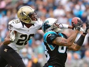 Carolina Panthers wide receiver Steve Smith (89) catches the ball as New Orleans Saints cornerback Keenan Lewis (28) defends in the first quarter at Bank of Americaon Sunday. (Bob Donnan-USA TODAY Sports)