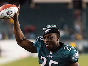 Philadelphia Eagles running back LeSean McCoy (25) celebrates as he leaves the field after defeating the Chicago Bears at Lincoln Financial Field on Dec 22, 2013 in Philadelphia, PA, USA. (Howard Smith/USA TODAY Sports)