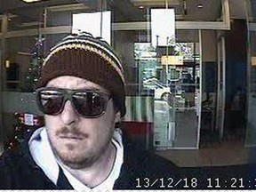Security camera image of a man wanted in connection with a Richmond Rd. bank robbery. (OTTAWA POLICE submitted image)