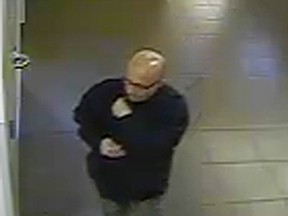 A surveillance shot of a man at the library. SUPPLIED