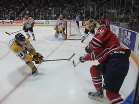 Bryan Moore attempts to block a pass from an Oshawa Generals forward during the Sarnia Sting home opener on Friday, Sept. 20. That game marked the beginning of the Sting season, and at the Christmas break they sit with a 12-20-1-2 record and in 8th place in the OHL's Western Conference. SHAUN BISSON/ THE OBSERVER/ QMI AGENCY