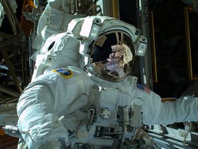 Astronauts aboard the International Space Station are planning a second and final spacewalk to fix the outpost's cooling system early on Tuesday.

(Reuters/NASA Handout)
