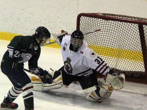 The Sarnia Legionnaires hit the Christmas break in the hunt for home-ice advantage for the first round of the playoffs. Netminder Braden Palocz has been solid in goal for the team. He is pictured here stretching out to rob St. Mary's Lincolns forward Nathan Smith on a breakaway. THE OBSERVER/QMI AGENCY