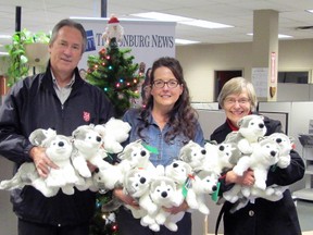 The Tillsonburg News’ Sharon Craig (centre) presents over 25 stuffed animals to Tillsonburg Salvation Army Pastors Ron (left) and Starr (right) Ferris Friday, December 20 at the News office. The stuffed animals were contributed to the annual Sally Ann toy drive. Tillsonburg News Photo