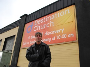 Jason McComb, an advocate for the homeless, stands outside Destination Church in St. Thomas. McComb is organizing a community Christmas dinner at the church for Christmas Day. All are welcome. (Ben Forrest, Times-Journal)