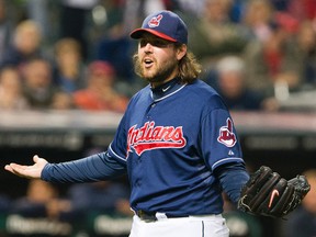 Closing pitcher Chris Perez of the Cleveland Indians reacts to hitting Tyler Flowers of the Chicago White Sox with a pitch during the ninth inning at Progressive Field on October 2, 2012 in Cleveland, Ohio.  (Jason Miller/Getty Images/AFP)