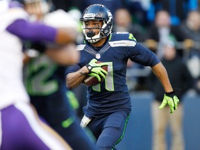 Seattle Seahawks wide receiver Percy Harvin (11) returns a kickoff against the Minnesota Vikings during the second quarter at CenturyLink Field on Nov. 17. (Joe Nicholson-USA TODAY Sports)