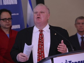 Mayor Rob Ford provides an update Christmas Day on the power outage that followed the weekend ice storm. (Dave Thomas/Toronto Sun)