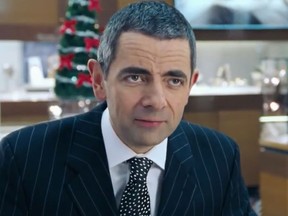 Rowan Atkinson plays a meticulous jewelry store clerk in Love Actually. (Screen grab