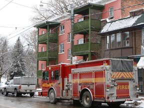 Emergency crews at the scene of a fatal apartment fire on Queen St. E., between Glen Manor Dr. and MacLean Ave., around 7:45 a.m. Wednesday, Dec. 25, 2013. (CHRIS DOUCETTE/TORONTO SUN)