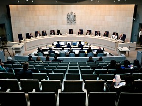 Councillors sit during city council's operating budget discussions at City Hall in Edmonton, Alta., on Monday, Nov. 25, 2013. Codie McLachlan/Edmonton Sun