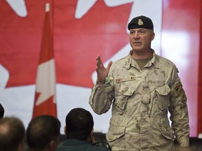 Canadian Brig.-Gen. Dean J. Milner addresses the crowd during the transfer of command authority ceremony held at Kandahar Airfield, in the province of Kandahar, in Afghanistan, on July 7 2011, during which the Canadians gave the command to the Americans. (PHILIPPE-OLIVIER CONTANT/QMI Agency)