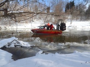 Emergency personnel search for the body of a five-year-old boy from the Nith River in New Hamburg. (Beacon Herald file photo)