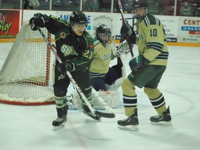St. Thomas Stars forward Carson Brookshaw, left, crowds in front of St. Marys Lincolns goaltender Andrew Masters and a St. Marys defenceman during the first period of Friday's Jr. B hockey game at the Timken Centre. Seventh-place St. Thomas was looking for its second win in a row against St. Marys, which sits ninth out of nine teams in the Greater Ontario Junior Hockey League's Western Conference. Ben Forrest/Times-Journal