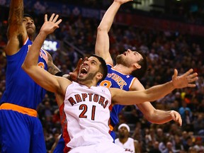 Raptors' Greivis Vasquez battles against the New York Knicks on Saturday night at the Air Canad Centre. (Dave Abel/Toronto Sun)
