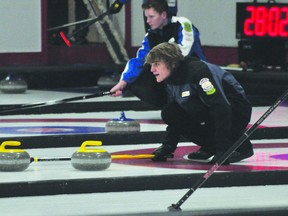 Sean Davidson yells for sweeping during action at the Canola Junior Provincials in Portage la Prairie Dec. 29. (Kevin Hirschfield/THE GRAPHIC/QMI AGENCY)