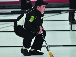 Austin Mustard watches his rock during action at the Canola Junior Provincials in Portage la Prairie Dec. 29. (Kevin Hirschfield/THE GRAPHIC/QMI AGENCY)