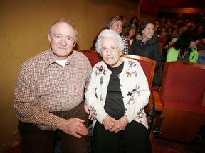 Stirling-Rawdon, Ont. resident and centenarian Alice Heasman, who turned 105 on Dec. 23, is seen with her good friend and neighbour Andrew Marre at Stirling Theatre, a few minutes before the cast of family Panto 'Rapunzel: a hairy tale' hits the stage Sunday afternoon. - JEROME LESSARD/The Intelligencer