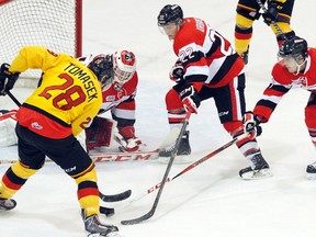The Belleville Bulls (yellow jerseys) got blanked 5-0 by the Ottawa 67's at Yardmen Arena Saturday night. Jerome Lessard The Intelligencer