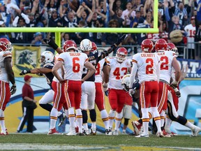 Kicker Ryan Succop #6 of the Kansas City Chiefs reacts after missing a 41 yard field goal attempt with four seconds left in regulation which would have won the game against the San Diego Chargers at Qualcomm Stadium on December 29, 2013 in San Diego, California. The Chargers won 27-2 in overtime.  Stephen Dunn/Getty Images/AFP