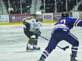 Portage Terriers defenceman Davis Ross looks for a lane during a game against the Neepawa Natives Dec. 31. (Kevin Hirschfield/THE GRAPHIC/QMI AGENCY)