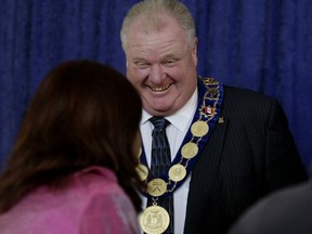 Toronto Mayor Rob Ford meets the public during the New Year's levee at City Hall on Wednesday, January 1, 2014. (Craig Robertson/Toronto Sun)