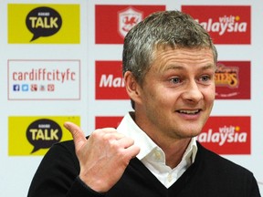Former Manchester United striker Ole Gunnar Solskjaer is officially unveiled as new manager of English Premier League soccer team Cardiff City during a news conference at their stadium in Cardiff, Wales January 2, 2014. (REUTERS)
