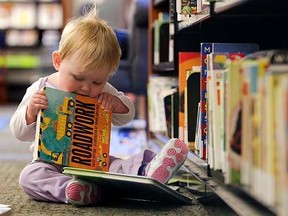 Rylee Tooley, 10 months, tastes a book at the Belleville Public Library Friday, Oct. 11, 2013 in Belleville, Ont. "Every couple of weeks we come in and pick up a new batch of books," said mother Tamara Tooley. The library has a variety of programs for children.
Luke Hendry/The Intelligencer/QMI Agency
FOR PAGINATORS:
Rylee Tooley, 10 months, tastes a book Friday at the Belleville Public Library. "Every couple of weeks we come in and pick up a new batch of books," said mother Tamara Tooley. The library has a variety of programs for children. Call 613-968-6731 or visit bellevillelibrary.ca for details.