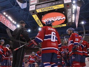 Strathroy Rockets head coach Mike Bondy leads his team through an on-ice workout at the Joe Louis Arena in Detroit Dec 23rd. For the second time in three years, the Rockets organization traveled west courtesy president and NHL referee Don Van Massenhoven to take in a pair of morning skates, a Red Wings game at night, tour of the facility and meeting with an NHL coach. The team also got an opportunity to take the ice for a 45-minute practice. 
JACOB ROBINSON/AGE DISPATCH/QMI AGENCY