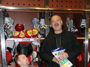 Rockets president and NHL referee Don Van Massenhoven laughs at a joke told by former Detroit Red Wing forward Thomas Holmstrom at Joe Louis Arena. Holmstrom said he may have scored more goals in the league had Van Massenhoven and his fellow referees not called so many back for goalie interference. 
JACOB ROBINSON/AGE DISPATCH/QMI AGENCY