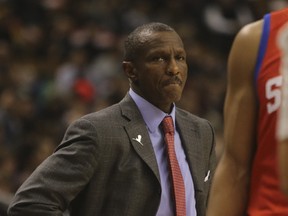 Raptors coach Dwane Casey watches as his team faces the Philadelphia 76ers in Toronto Friday, December 13, 2013. (Jack Boland/Toronto Sun)
