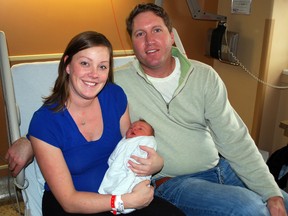 The first baby born at St. Thomas Elgin General Hospital was Camden Underhill, pictured at the hospital with mother Julie and father Chad, who live near Vienna. Underhill was born at 6:55 a.m. on New Year's Day and weighed nine pounds, nine ounces. He is the third son for Julie and Chad.