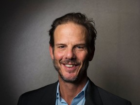 Director Peter Berg poses for a portrait while promoting the film "Lone Survivor" in New York, December 5, 2013. The film is based on the memoir by former U.S. Navy SEAL Marcus Luttrell about the 2005 mission "Operation Red Wings" in Afghanistan. REUTERS/Lucas Jackson