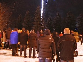 A large crowd takes in the fireworks finale during the third annual Family New Year's Eve event at the Vulcan District Arena. The event also marked the windup of the Town of Vulcan's centennial year.