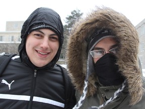 Gustavo Barea, left, and Pedro Ferreira, incoming Brazilian students at Queen's University, have arrived for their new studies in the middle of a frigid Arctic blast.
Michael Lea The Whig-Standard