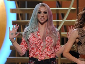 Singer Ke$ha performs onstage during the 2013 American Music Awards at Nokia Theatre L.A. Live on November 24, 2013 in Los Angeles, California.   (Kevin Winter/Getty Images/AFP)