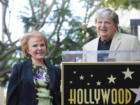 Late musician Buddy Holly's wife Maria Elena Holly looks on as musician Phil Everly speaks during a ceremony posthumously awarding Buddy Holly with a Star on the Hollywood Walk of Fame in Hollywood September 7, 2011. (REUTERS/Phil McCarten)