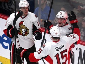 Ottawa Senators left wing Colin Greening (14) celebrates his goal during the first period with teammates right wing Erik Condra (22) and center Zack Smith (15) against the Montreal Canadiens at Bell Centre.
Jean-Yves Ahern/USA TODAY Sports