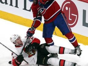 Montreal Canadiens defenseman P.K. Subban (76) is called for a minor penalty against Ottawa Senators right wing Erik Condra (22) during the third period at Bell Centre. Mandatory Credit: Jean-Yves Ahern-USA TODAY Sports