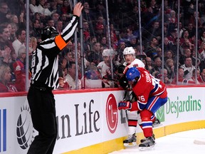 A penalty is called against Montreal Canadiens defenceman P.K. Subban for hooking Ottawa Senators forward Erik Condra at the Bell Centre in Montreal, Jan. 4, 2014. (RICHARD WOLOWICZ/Getty Images/AFP)