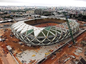 An aerial view of the Arena Amazonia stadium, under construction to host 2014 World Cup soccer matches, after work was suspended by a labor court following the accidental death of a  worker last Saturday, in Manaus December 17, 2013. (REUTERS)
