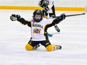 Carson Harmer of the Mitchell Tyke #2 team celebrates a goal during action from the Hawks’ Cup last Thursday, Jan. 2 against BCH. Harmer was an offensive force in leading the Meteors to the Tyke Division championship in the two-day tournament. ANDY BADER/MITCHELL ADVOCATE