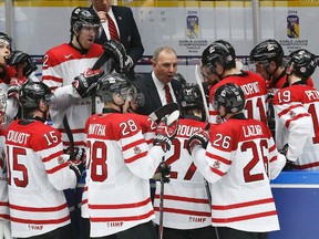 Canada's head coach Brent Sutter directs his team in the last minutes of play against Russia in the third period of their IIHF World Junior Championship bronze medal ice hockey game in Malmo, Sweden, January 5, 2014.  (REUTERS)