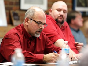 Coun. Taso Christopher question city staff about issues related to a new subdivision slated for lands north of Mudcat Road, in Belleville's Thurlow Ward.
 JASON MILLER/The Intelligencer/QMI Agency