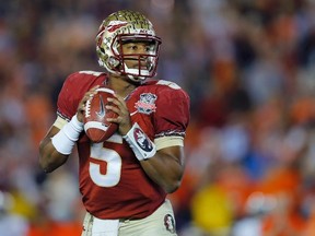 Florida State Seminoles quarterback Jameis Winston looks for a receiver against the Auburn Tigers in the first quarter 
during the NCAA BCS Championship game in Pasadena on Monday..  (REUTERS/Mike Blake)