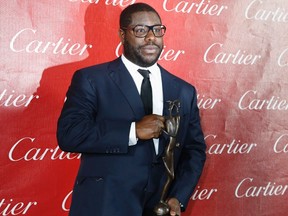 British film director Steve McQueen of the film "12 Years A Slave" poses after  wining Director of the Year at the 2014 Palm Springs International Film Festival Awards Gala in Palm Springs, California January 4, 2014.  REUTERS/Fred Prouser