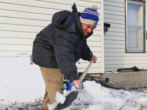 ice winter weather Ian Robinson shovel